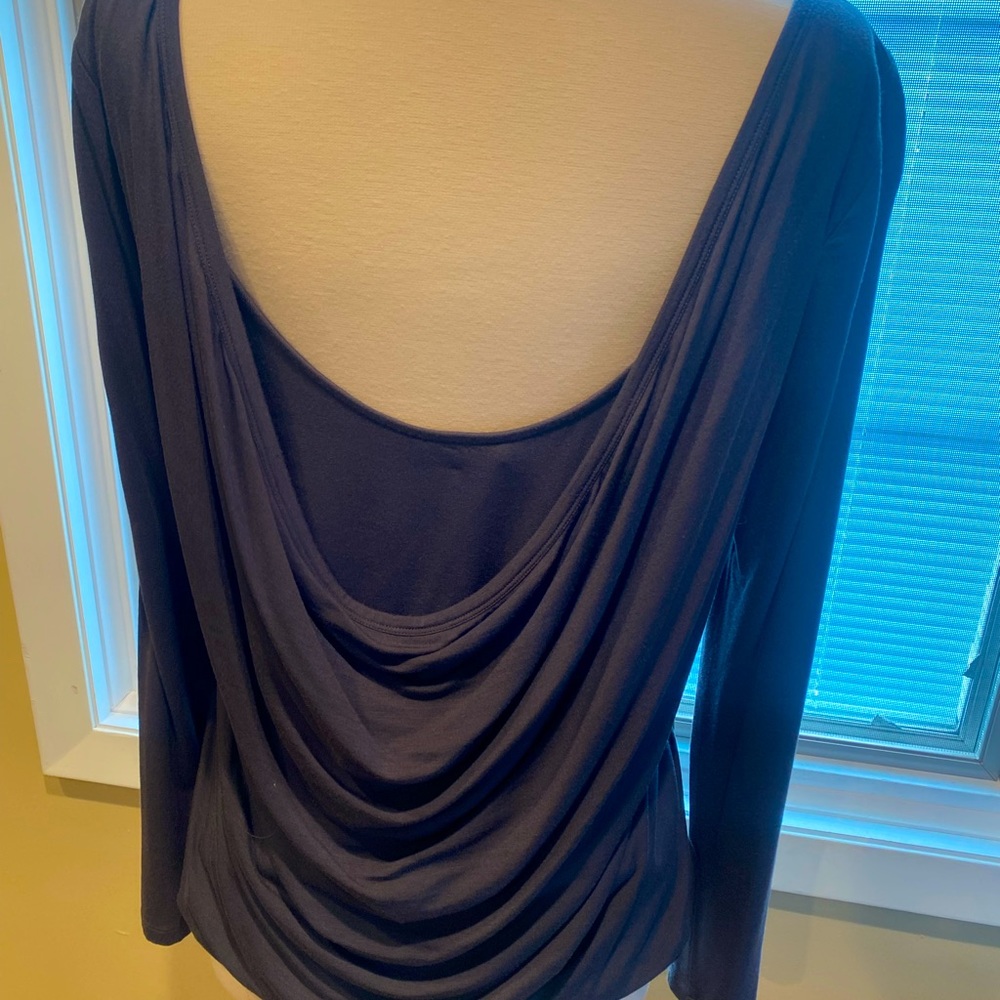 Grey  (bluish tone) drapey loser back top.  Does not have tags but  never worn